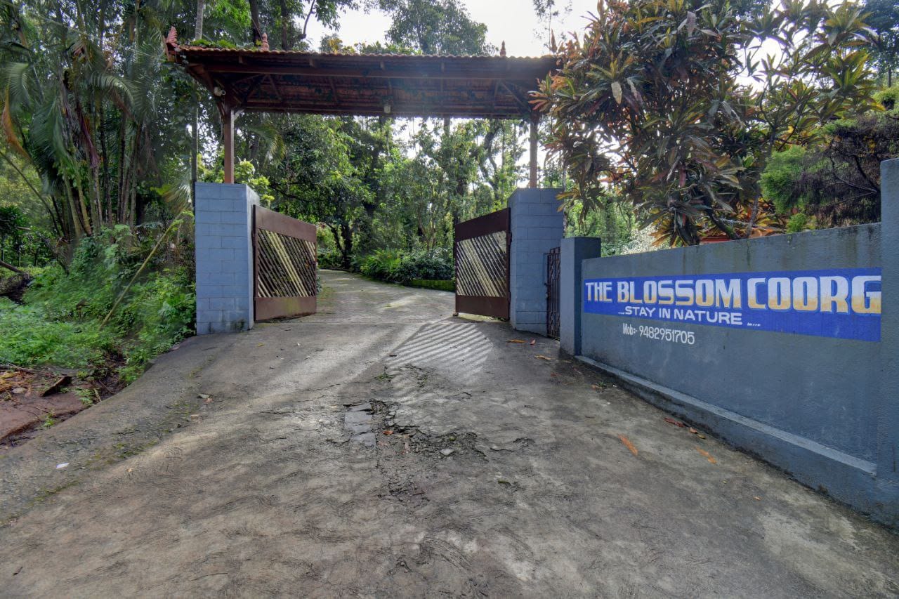 The Blossom Coorg Resort main entrance gate welcomes you